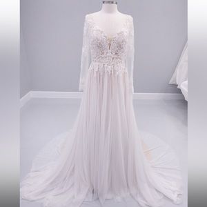 Beautiful Private label wedding dress with sleeves.